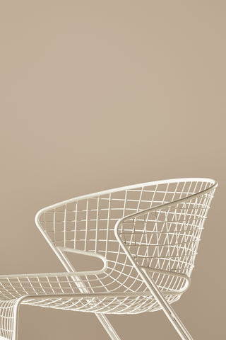 ND lounge chair on a beige background
