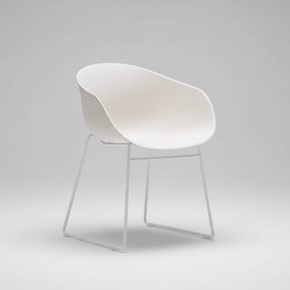 Modern white chair on a gray background