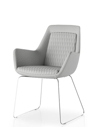 Sled base chair with quilted backrest on a white background