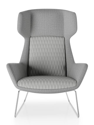 Gray armchair with quilted design on a white background