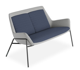 Modern two-seater sofa with blue cushions and a white frame on a white background