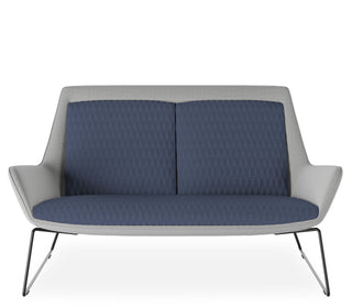 Modern two-seater sofa with blue cushions and a gray frame on a white background