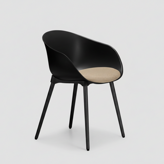 Black chair with beige seat on a light gray background