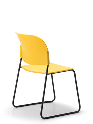 Advanta_Lumia-77 yellow chair with black metal legs on a white background
