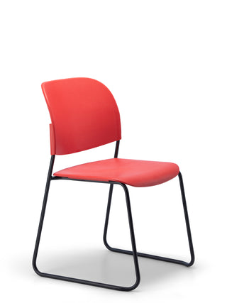 Red chair with black metal frame on a white background