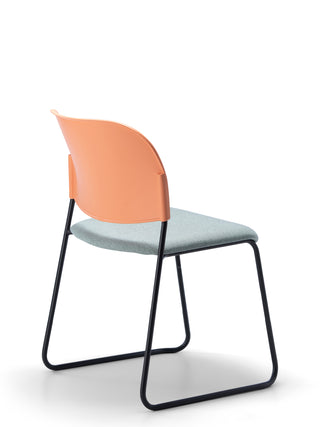 Advanta_Lumia-87 modern chair with a peach backrest and gray seat on a white background