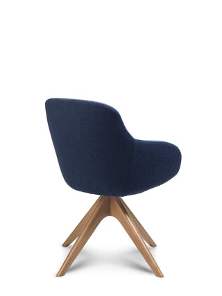 Navy blue chair with wooden legs on a white background
