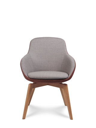 Gray upholstered chair with wooden legs on a white background