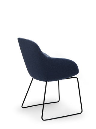 Modern chair with blue upholstered seat and black metal legs on a white background