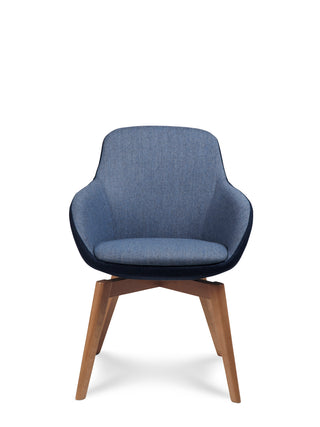 Blue upholstered chair with wooden legs on a white background