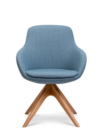Blue upholstered chair with wooden legs on a white background