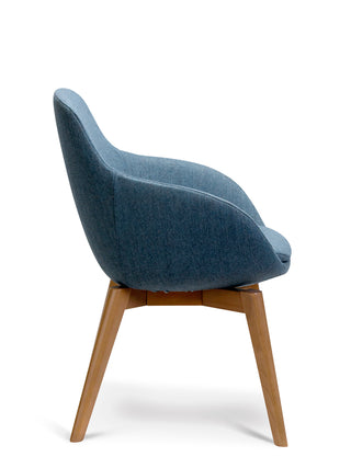 Blue upholstered chair with wooden legs on a white background