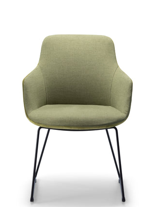 Green upholstered chair with metal legs on a white background