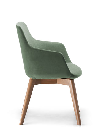 Green chair with wooden legs on a white background
