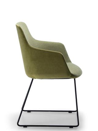 Green chair with metal legs on a white background