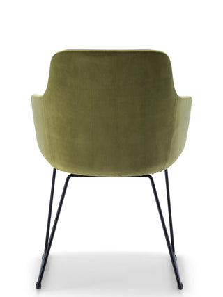 Green chair with black metal legs on a white background