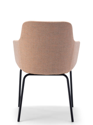 Peach chair with black metal legs on a white background