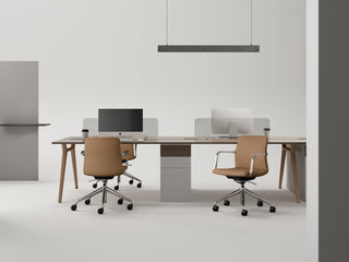 Modern office setup with a desk, chairs, and computer monitors in a minimalistic office.