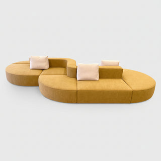 Mustard yellow modular sofa with beige cushions on a white background