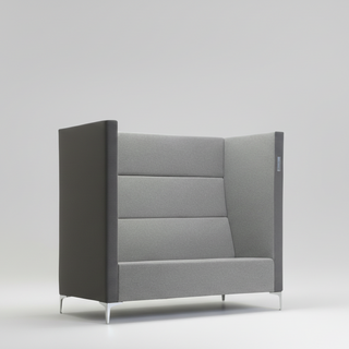 Gray upholstered office pod with white legs on a light gray background