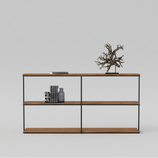 Metal and wood shelf with decorative items on a plain background