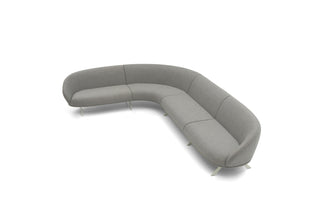 Gray curved sofa on a white background