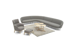 Gray sectional sofa with armchair, ottoman, and coffee table on a white background