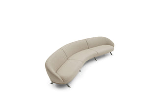 Beige curved sofa on a white background