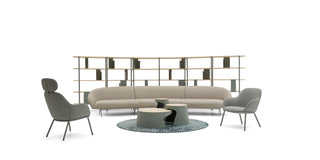 Modern furniture set with a sofa, chairs, and coffee table on a white background