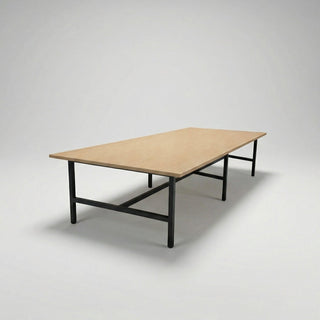 Wooden table with black metal legs on a gray background