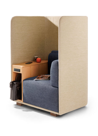 Small office pod with a desk, chair, and small table on a white background