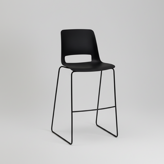 Black bar stool with a minimalist design on a gray background