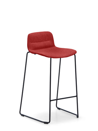 Red bar stool with black legs on a white background
