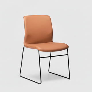 Brown chair with black metal legs on a light gray background