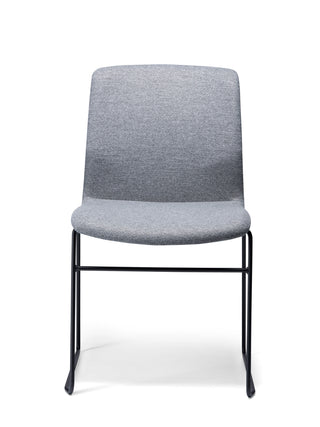 Odin Sled fabric front upholstered chair with black metal legs on a white background