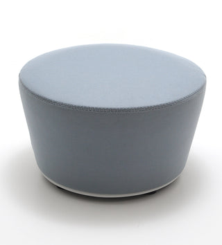 Round gray ottoman on a white background