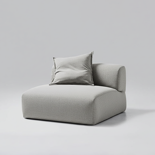 Gray upholstered chair with a matching pillow on a light gray background