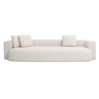 Beige sofa with three cushions on a white background